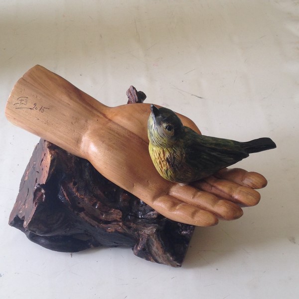 L'oiseau dans la main