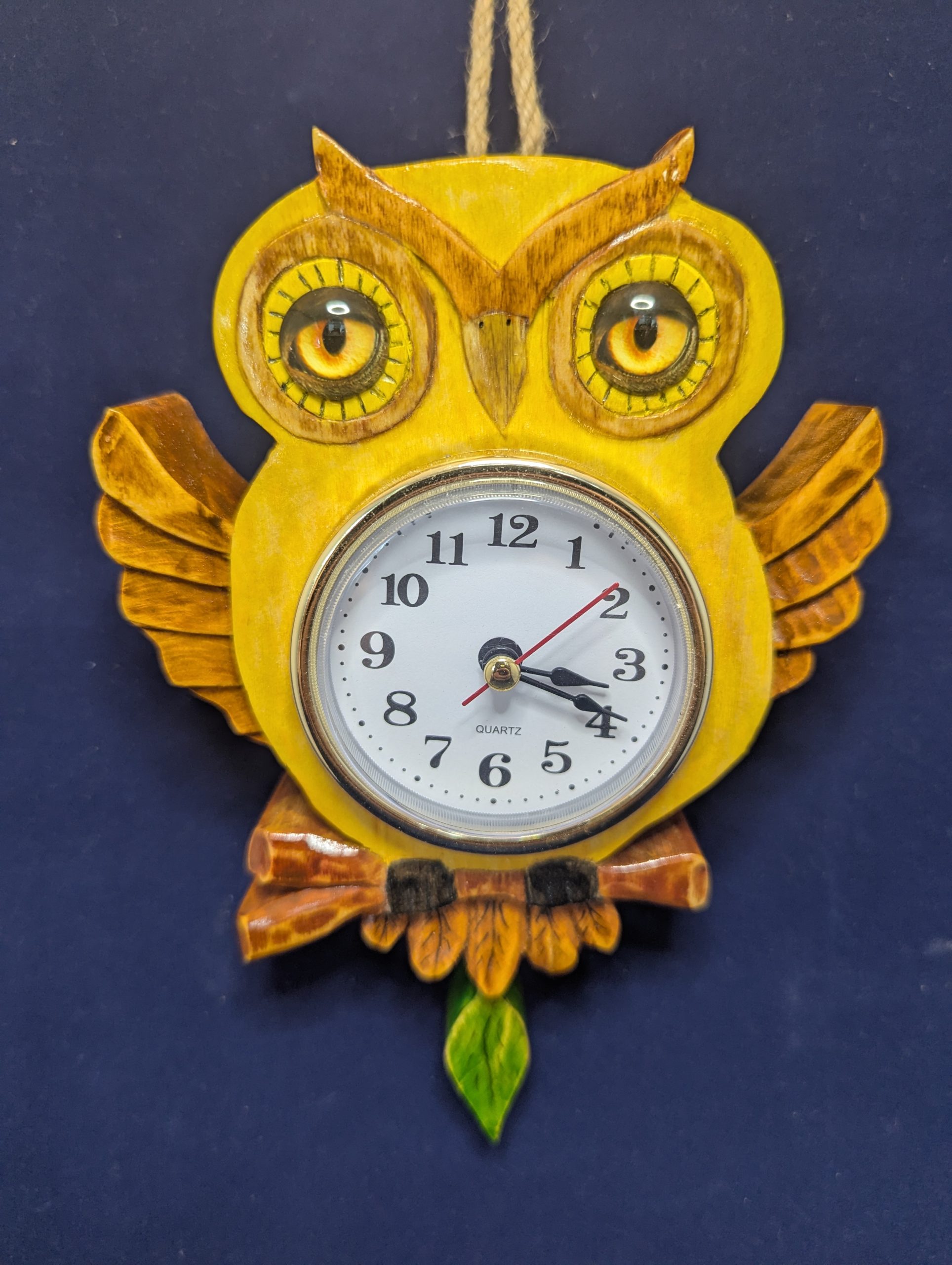 Horloge en bois sculptée main chouette